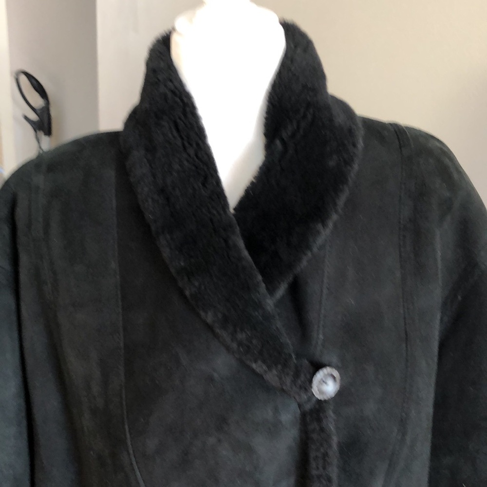 Black shearling mid length coat